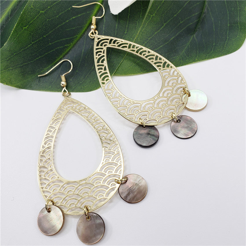 Carved Waves Double Teardrop Earrings Sustained With Triple Black Lip Shell Rounds