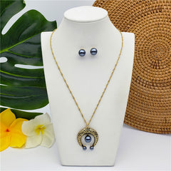 Set Of Petrol Pearl Stud Earrings And Carved Horseshoe Necklace In Silver/Gold With Petrol Pearl