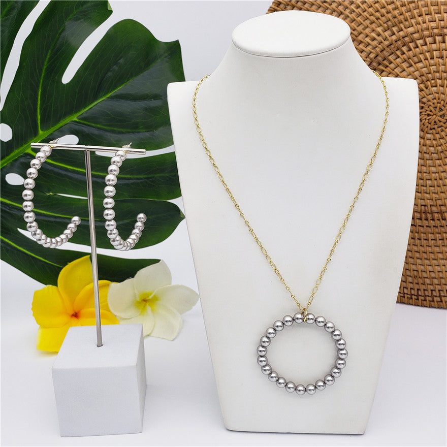 Set Of Half Round Pearl Earrings And Round Pearl Necklace In Different Colors