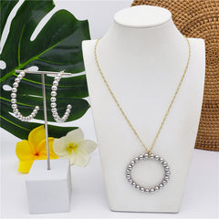 Set Of Half Round Pearl Earrings And Round Pearl Necklace In Different Colors