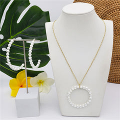 Set Of Half Round Pearl Earrings And Round Pearl Necklace In Different Colors