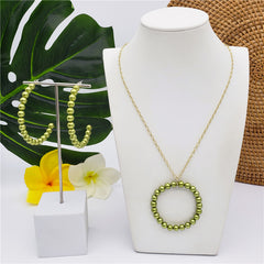 Set Of Half Round Pearl Earrings And Round Pearl Necklace In Different Colors