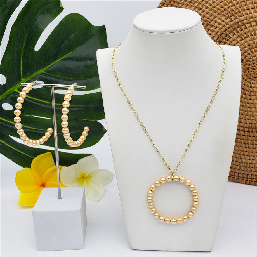Set Of Half Round Pearl Earrings And Round Pearl Necklace In Different Colors