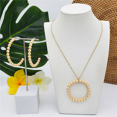 Set Of Half Round Pearl Earrings And Round Pearl Necklace In Different Colors
