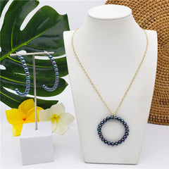 Set Of Half Round Pearl Earrings And Round Pearl Necklace In Different Colors
