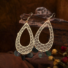 Carved Waves Double Teardrop Earrings Sustained With Triple Black Lip Shell Rounds