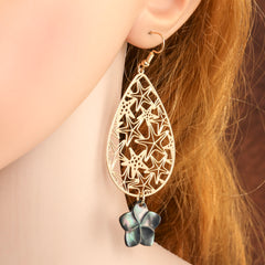 Carved Starfish Teardrop Earrings Sustained With A Black Lip Shell Plumeria Flower