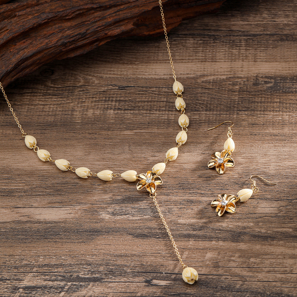 Set Of Ivory Color Pikake Flower Beads Earrings And Necklace With Plumeria Flower Centered With White Zircon