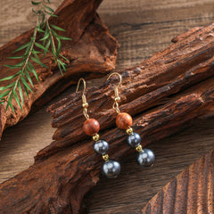 Set Of Bracelet, Drop Earrings And Necklace With Wooden Beads, Golden Brass Beads And Shell Pearls