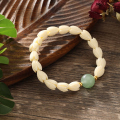 Hawaiian Pikake Flower Beads Bracelet With Golden Beads And A Pearl In Different Colors