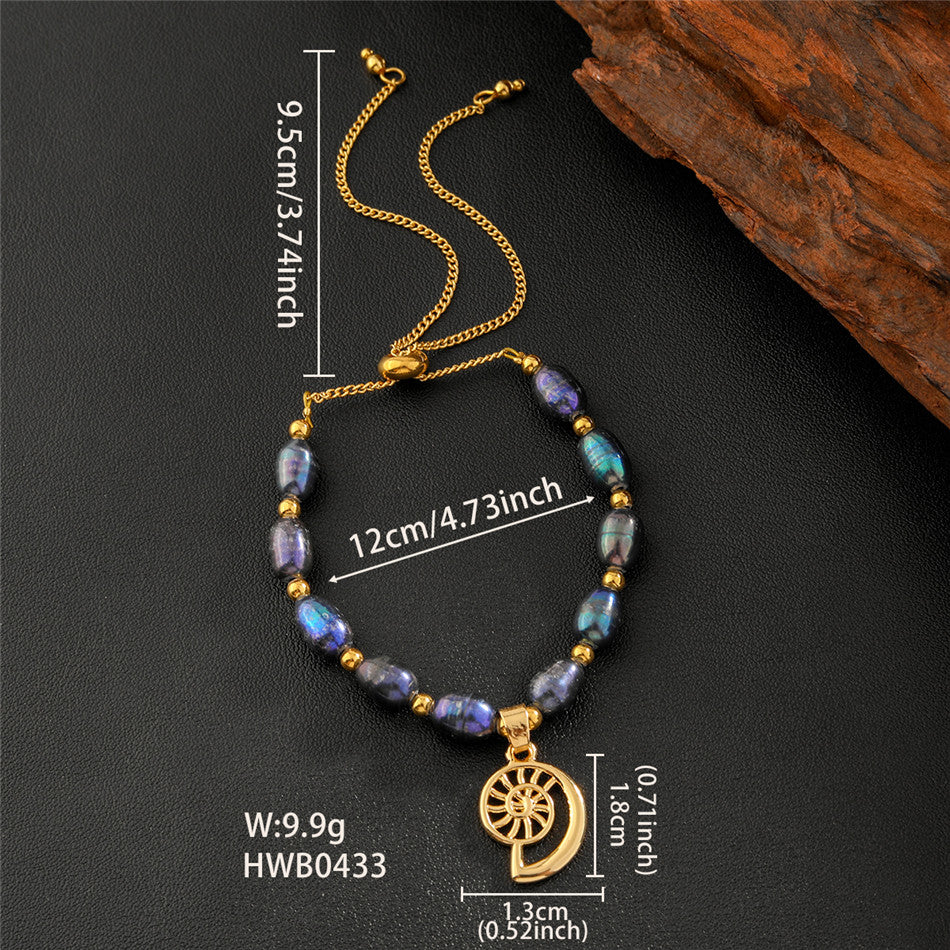 Tahitian Black Pearls Bracelet With Golden Beads In Hawaiian Charms