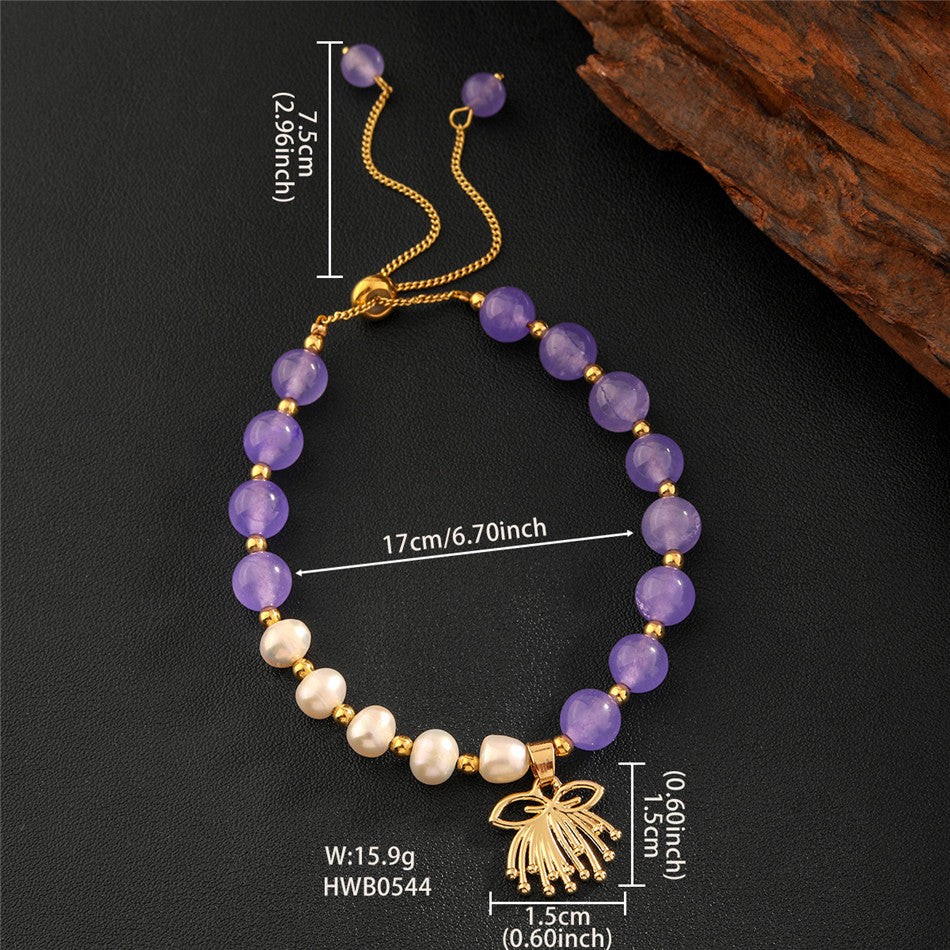 Pearls Bracelet With Golden Beads In Different Hawaiian Charms