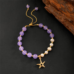 Pearls Bracelet With Golden Beads In Different Hawaiian Charms