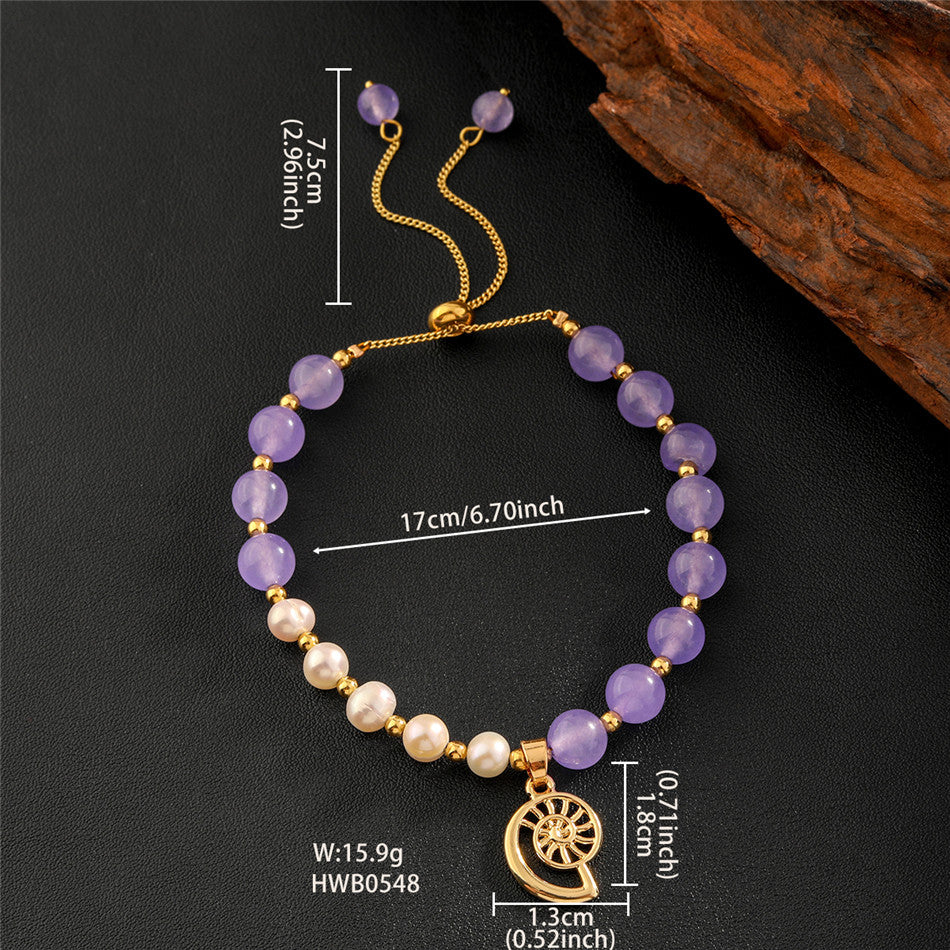 Pearls Bracelet With Golden Beads In Different Hawaiian Charms