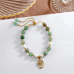 Green Gemstones & Pearls Bracelet With Light Silver Pearls And Golden Beads In Different Hawaiian Charms