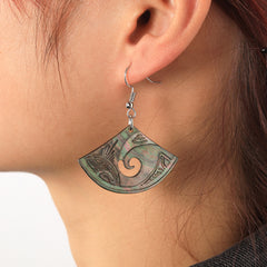 Abalone Shell and Light Silver Designed With a Wave Inside it Earring