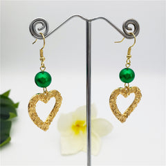 Carved Heart Earrings Sustained With A Pearl In Different Colors