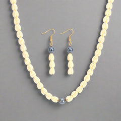 Set Of Hawaiian Ivory Color Pikake Flower Beads Necklace And Drop Earring With Petrol Pearl