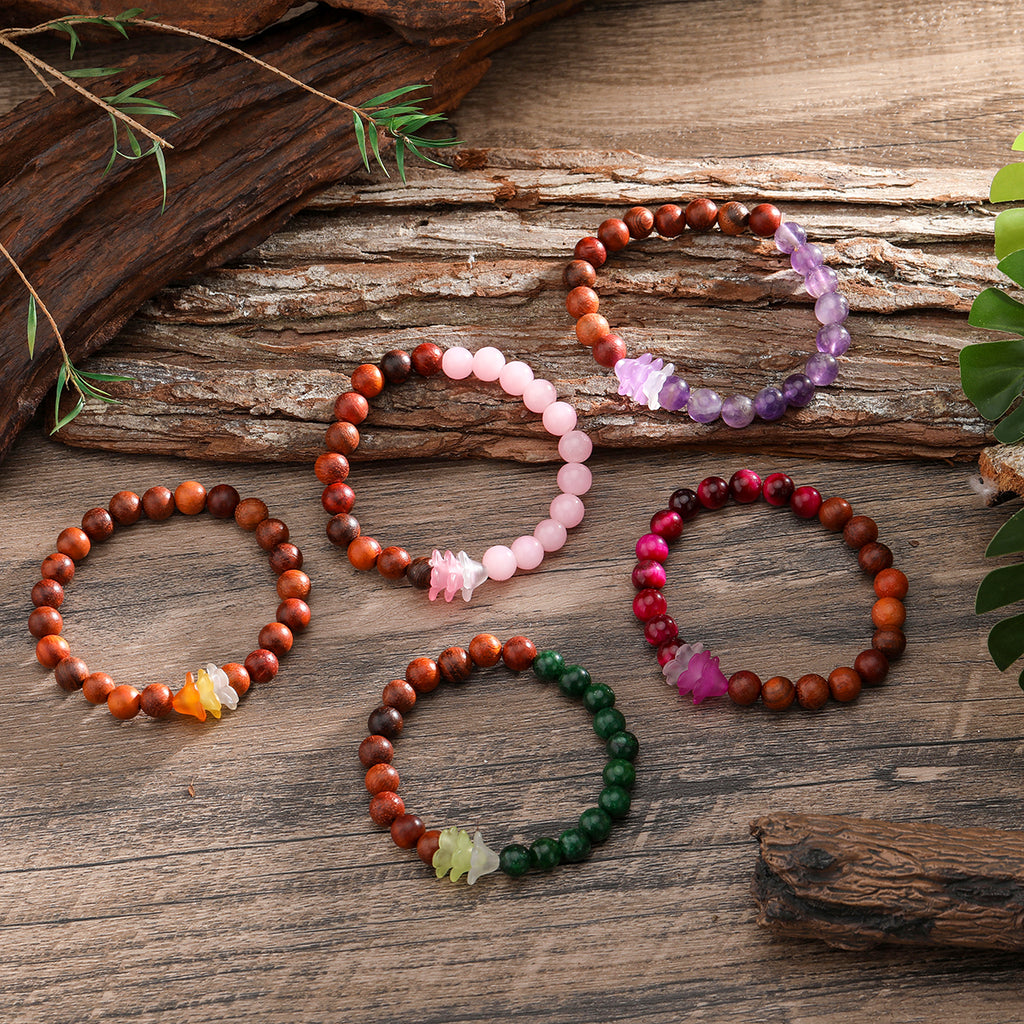 Hawaiian Wooden Beads Bracelet With Triple Flowers In Different Colors