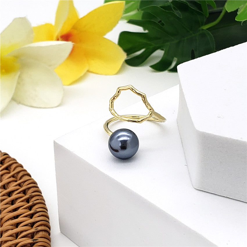 Wavy Ring With A Pearl In Different Styles And Colors