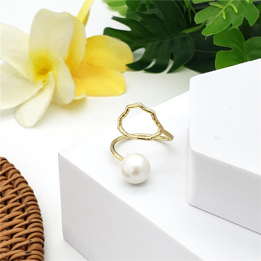 Wavy Ring With A Pearl In Different Styles And Colors