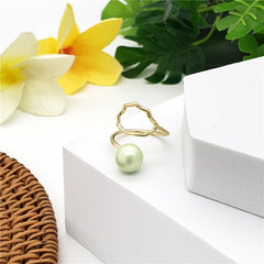 Wavy Ring With A Pearl In Different Styles And Colors