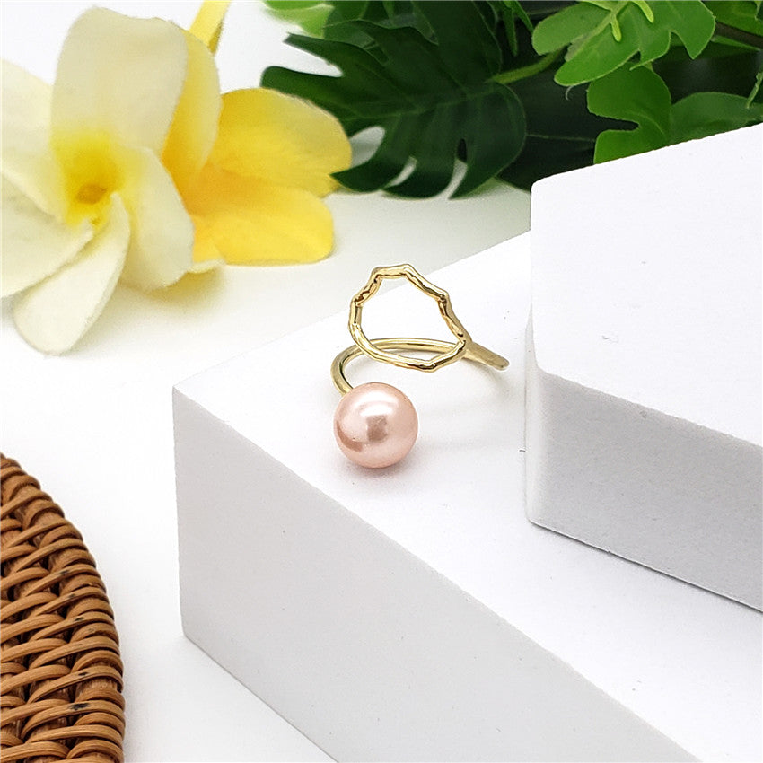 Wavy Ring With A Pearl In Different Styles And Colors