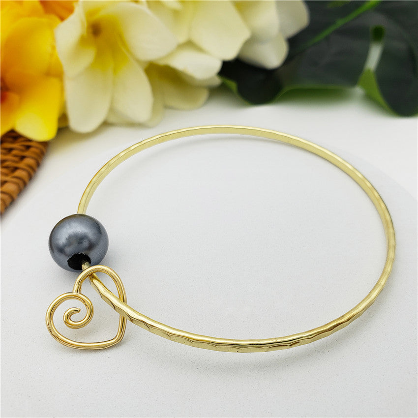 Bracelet With A Pearl & Charm In Different Styles And Colors