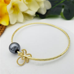 Bracelet With A Pearl & Charm In Different Styles And Colors