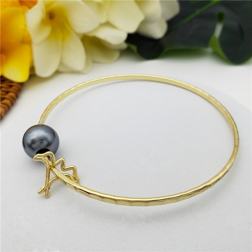 Bracelet With A Pearl & Charm In Different Styles And Colors