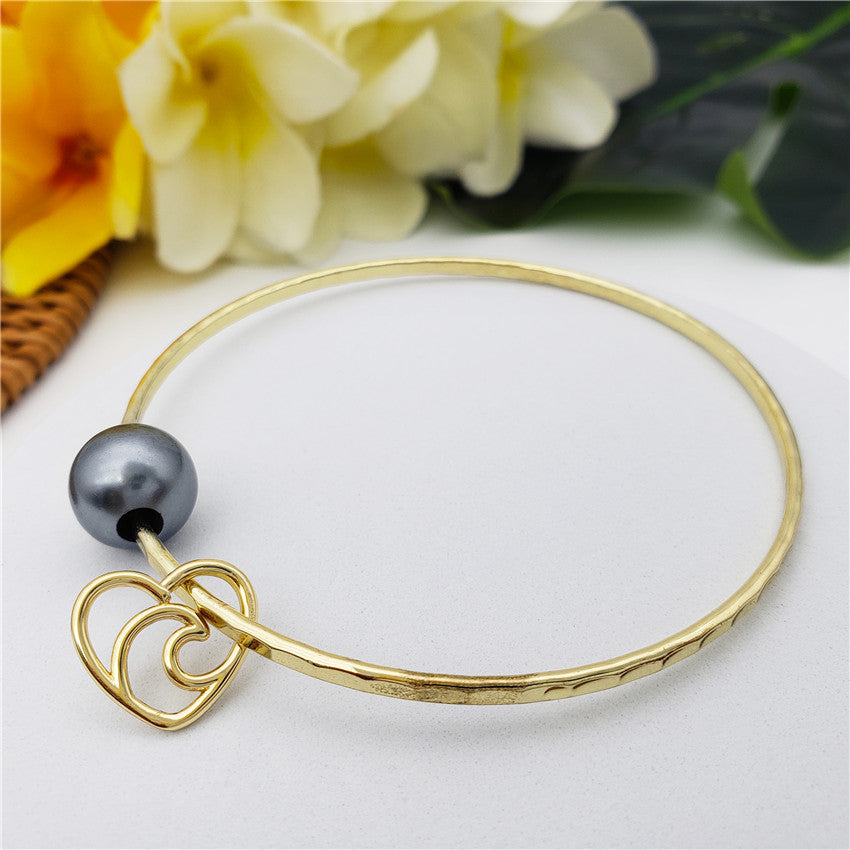 Bracelet With A Pearl & Charm In Different Styles And Colors