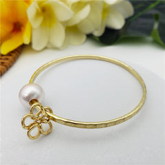 Bracelet With A Pearl & Charm In Different Styles And Colors