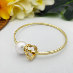 Bracelet With A Pearl & Charm In Different Styles And Colors