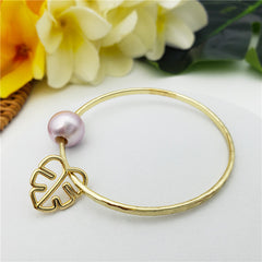 Bracelet With A Pearl & Charm In Different Styles And Colors