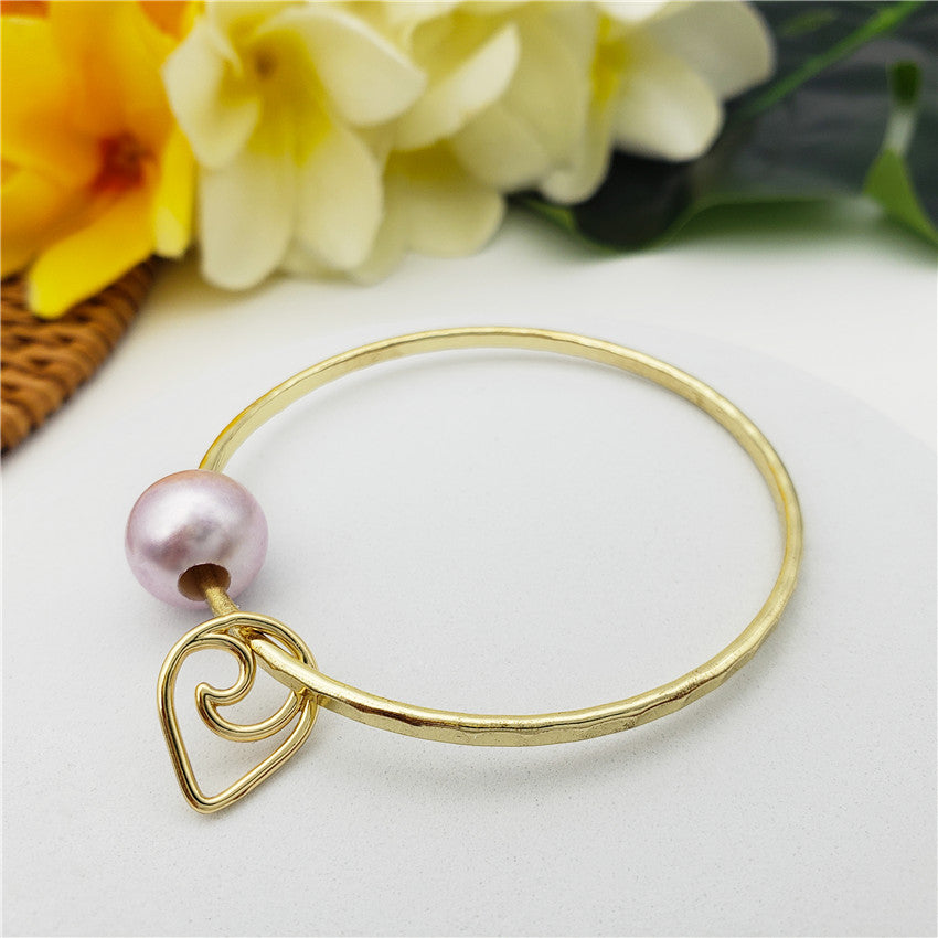 Bracelet With A Pearl & Charm In Different Styles And Colors