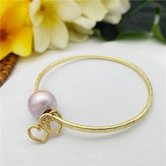 Bracelet With A Pearl & Charm In Different Styles And Colors