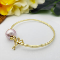 Bracelet With A Pearl & Charm In Different Styles And Colors