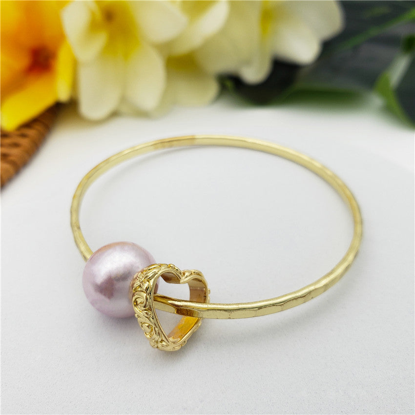 Bracelet With A Pearl & Charm In Different Styles And Colors