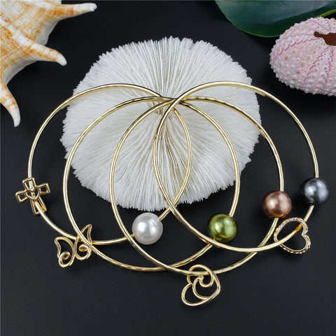 Bracelet With A Pearl & Charm In Different Styles And Colors