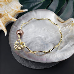 Wavy Bracelet With A Pearl & Charm In Different Styles And Colors