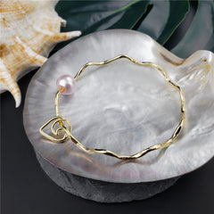 Wavy Bracelet With A Pearl & Charm In Different Styles And Colors