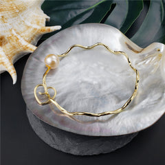 Wavy Bracelet With A Pearl & Charm In Different Styles And Colors