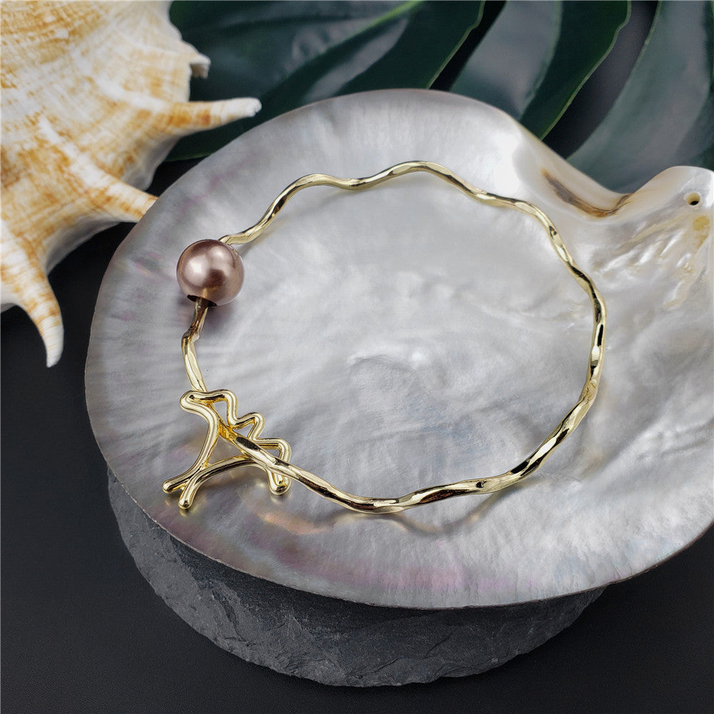 Wavy Bracelet With A Pearl & Charm In Different Styles And Colors