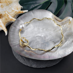 Wavy Bracelet With A Pearl & Charm In Different Styles And Colors