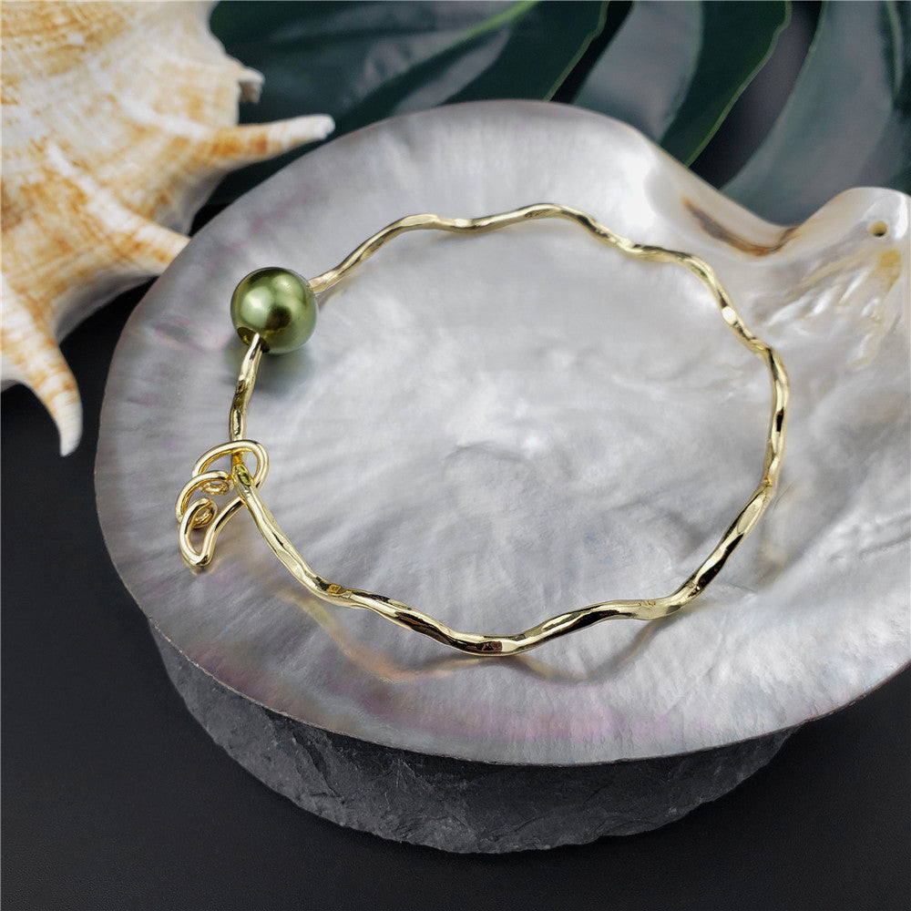 Wavy Bracelet With A Pearl & Charm In Different Styles And Colors