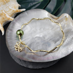 Wavy Bracelet With A Pearl & Charm In Different Styles And Colors