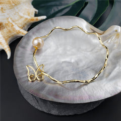 Wavy Bracelet With A Pearl & Charm In Different Styles And Colors