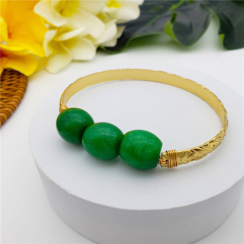 Carved Bracelet With Green Beads