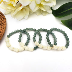 Hawaiian Bracelets In Different Colors With Golden And Ivory Color Beads