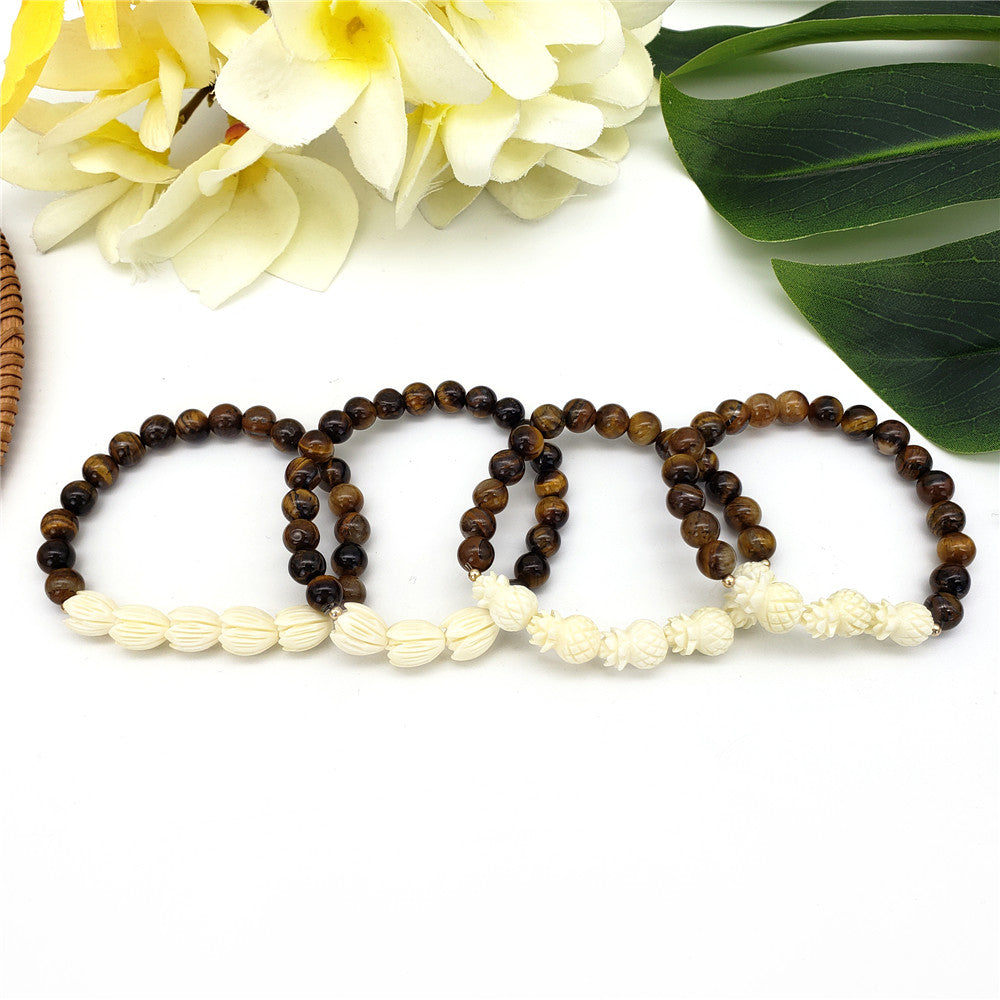 Hawaiian Bracelets In Different Colors With Golden And Ivory Color Beads